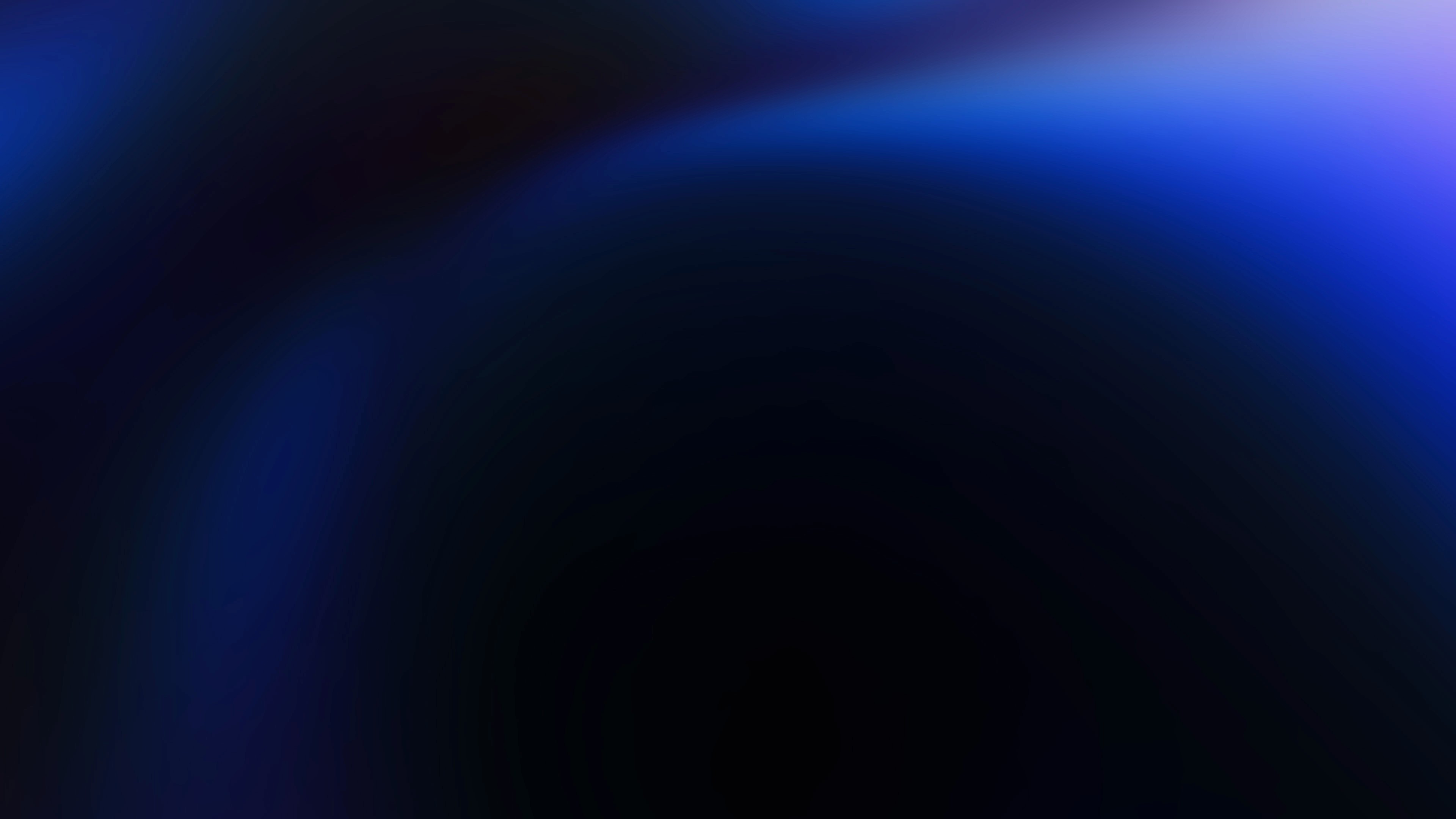 Abstract dark gradient background with soft blue highlights
