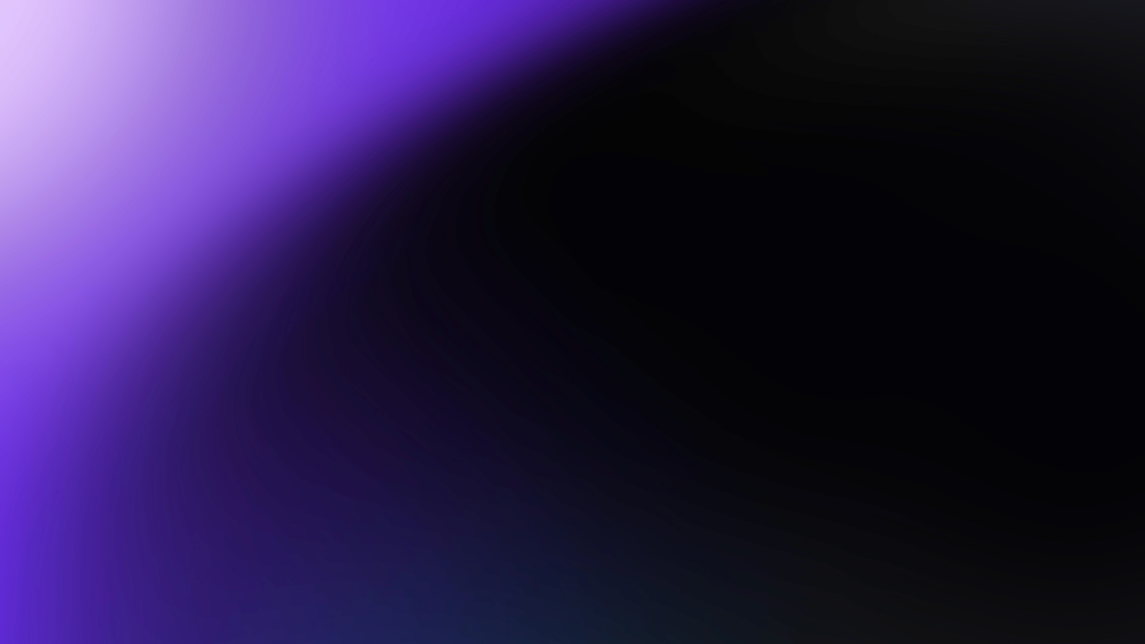 Abstract dark gradient background with purple glow